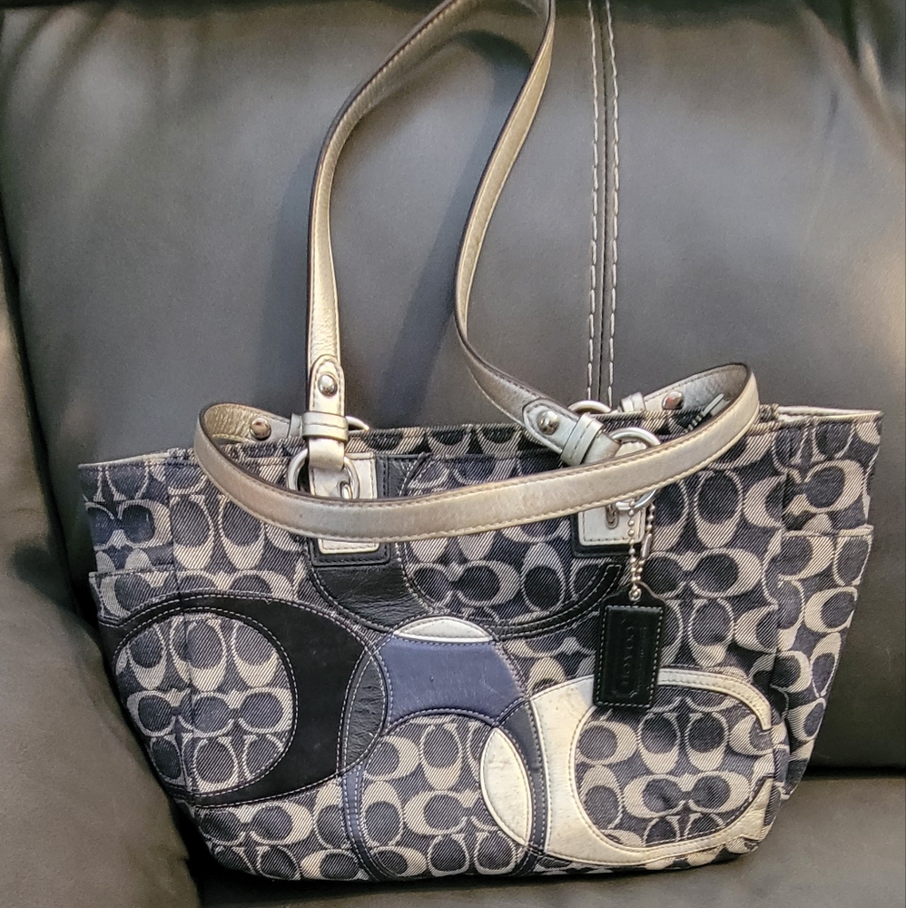 Blue and silver coach purse.